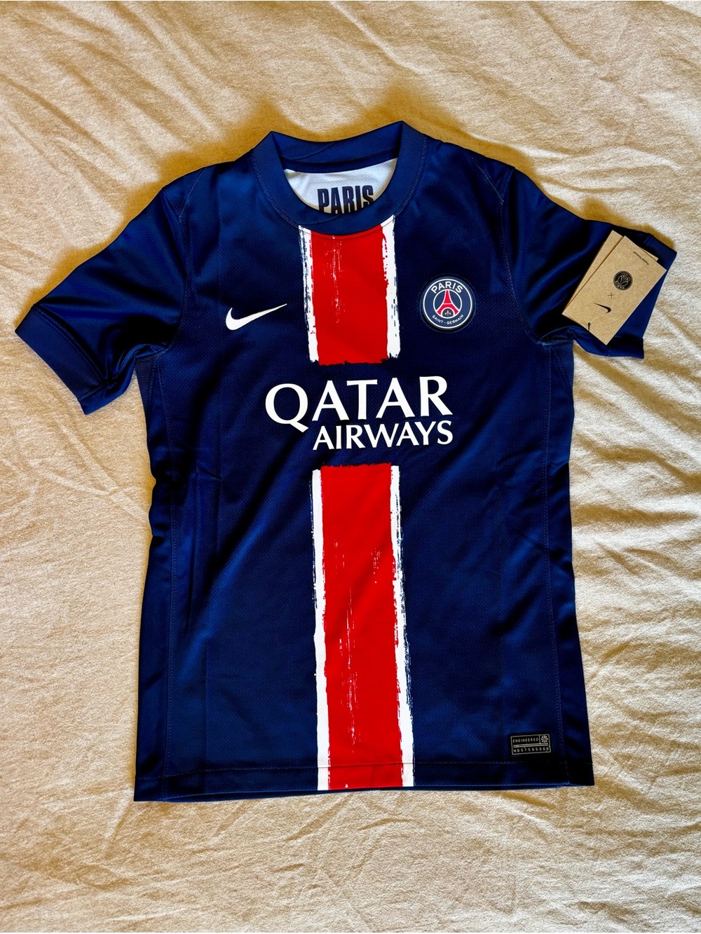 Nike Youth PSG Home Soccer Jersey in Navy with Red Stripe